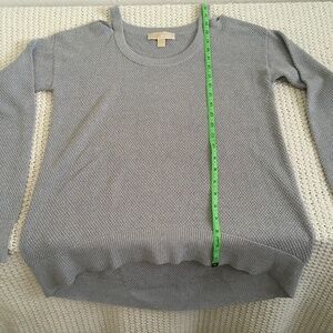 MICHAEL KORS SHOULDER HOLE SWEATER,  SIZE MEDIUM, SILVER